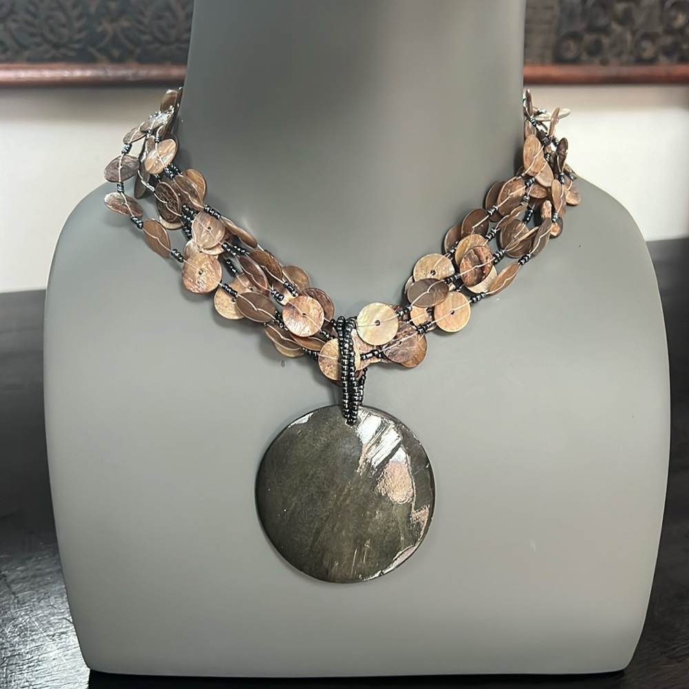 Beaded Multi Strand Brown Black Necklace with a large round pendant Round Beads